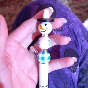 Handcrafted refillable snowman pens